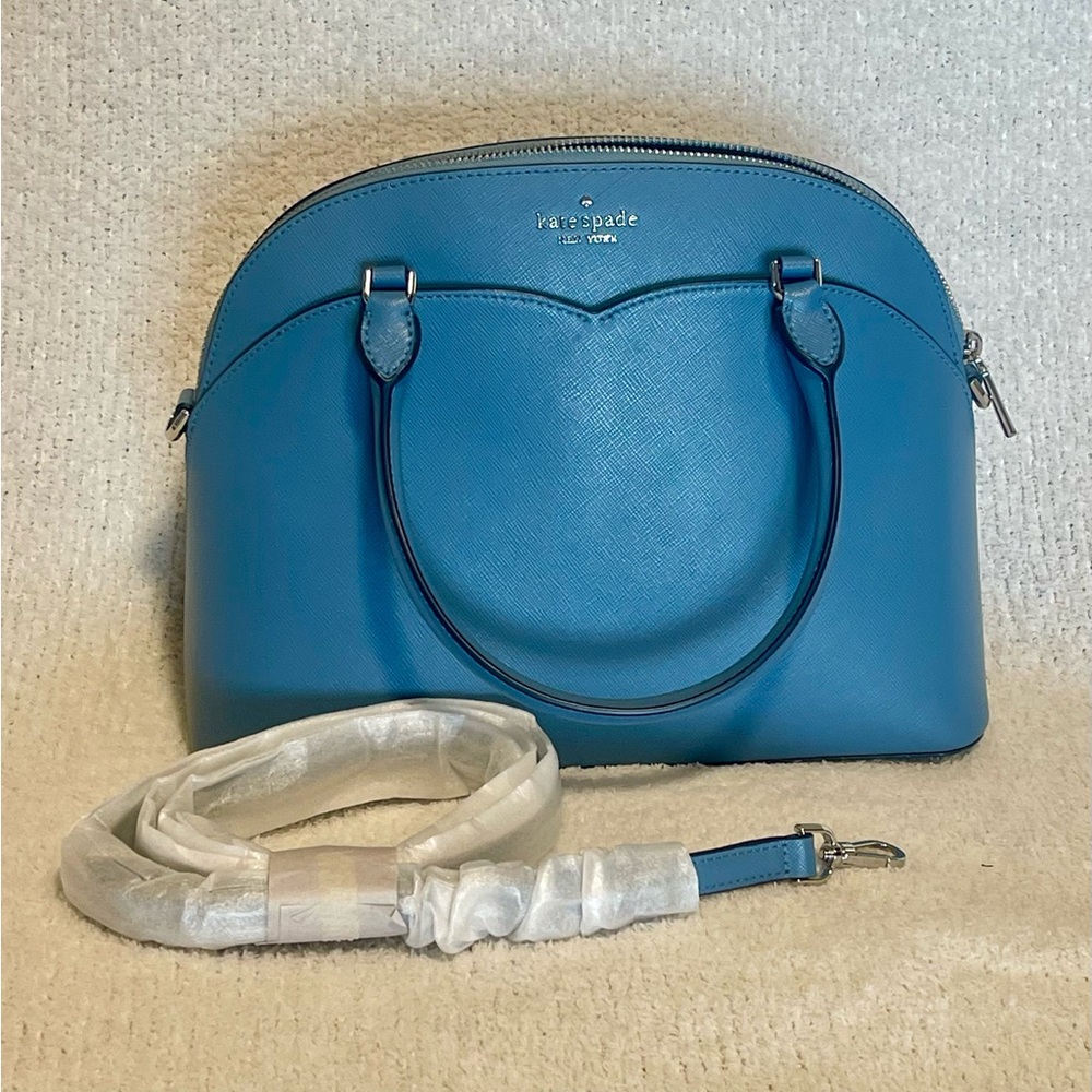 KATE SPADE Never Used! No tags on bag. Beautiful blue with silver hardware.